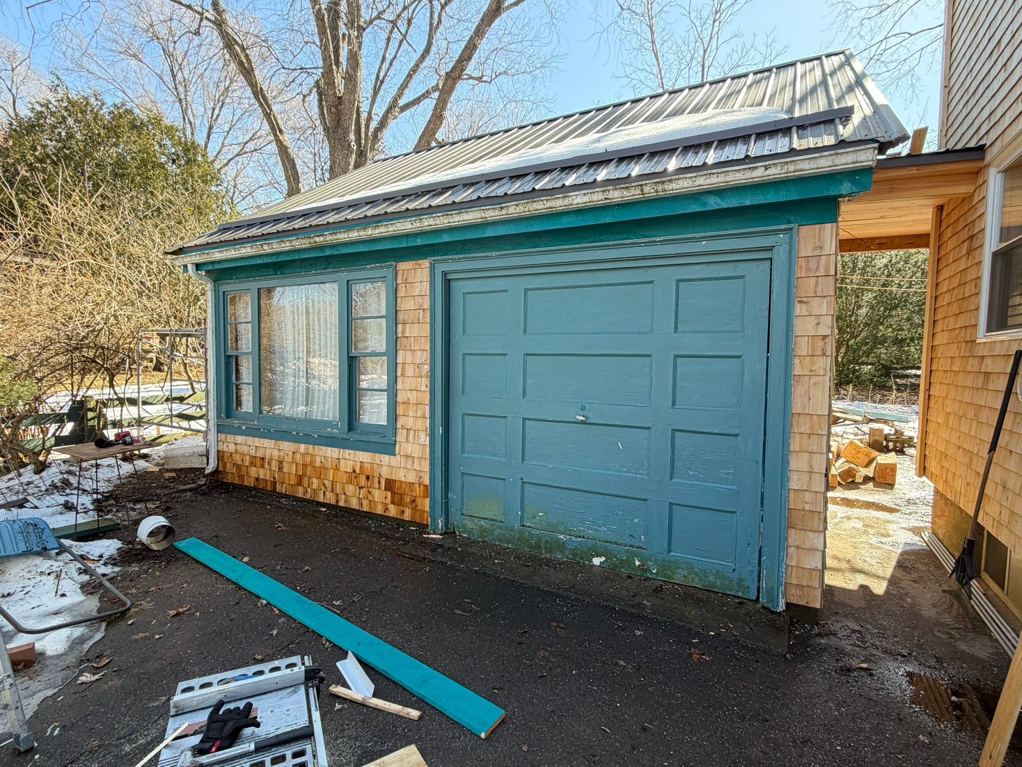 Cedar-sided garage restoration